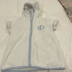 White hooded toddler zip-up towel cover-up with initials “LJC”